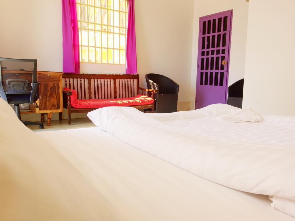 B52 Hostel Phnom Penh Rom bilde